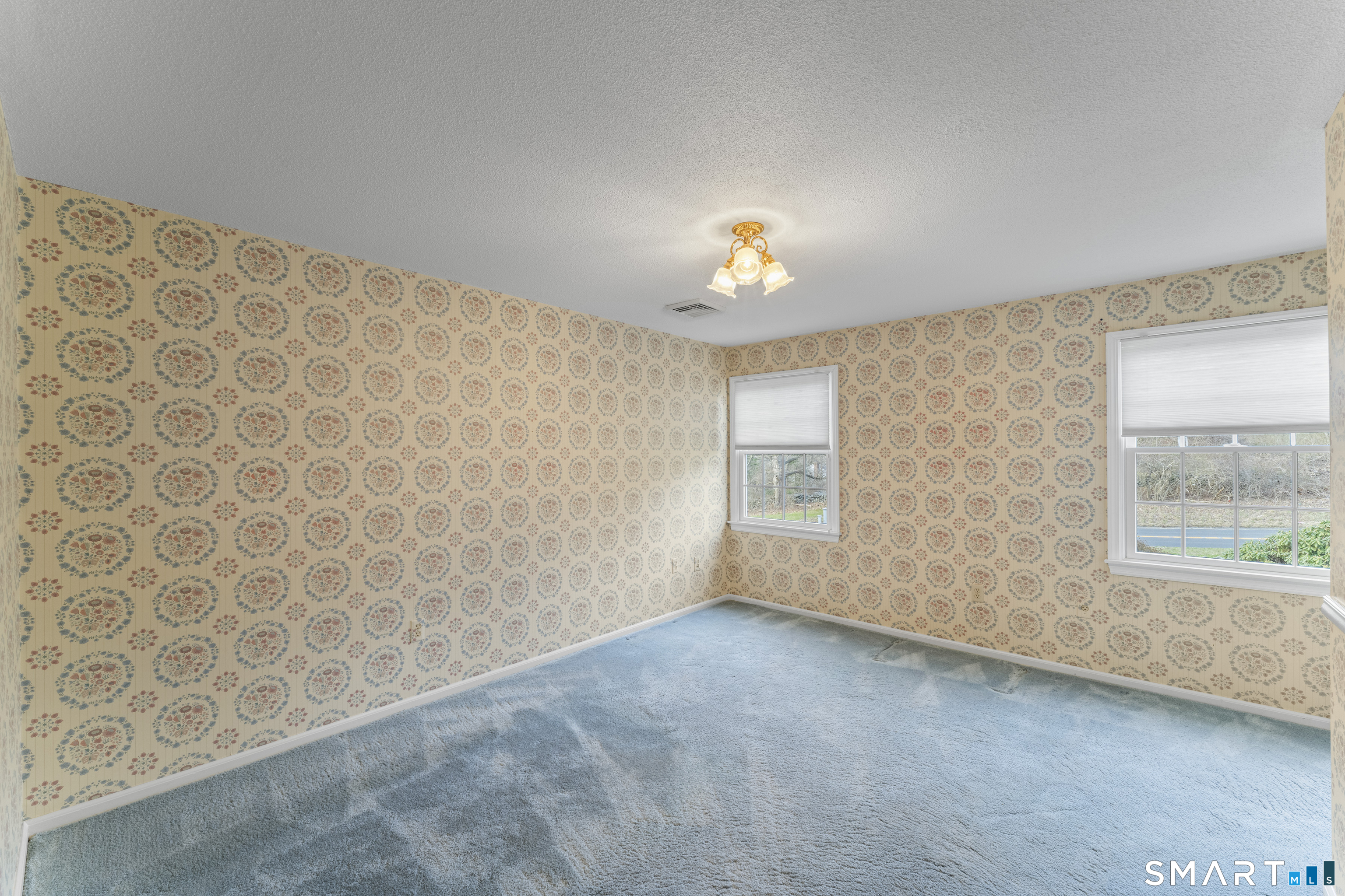 30 Currituck Road Newtown, CT 06470 - Photo 28 of 38 an empty room with a window