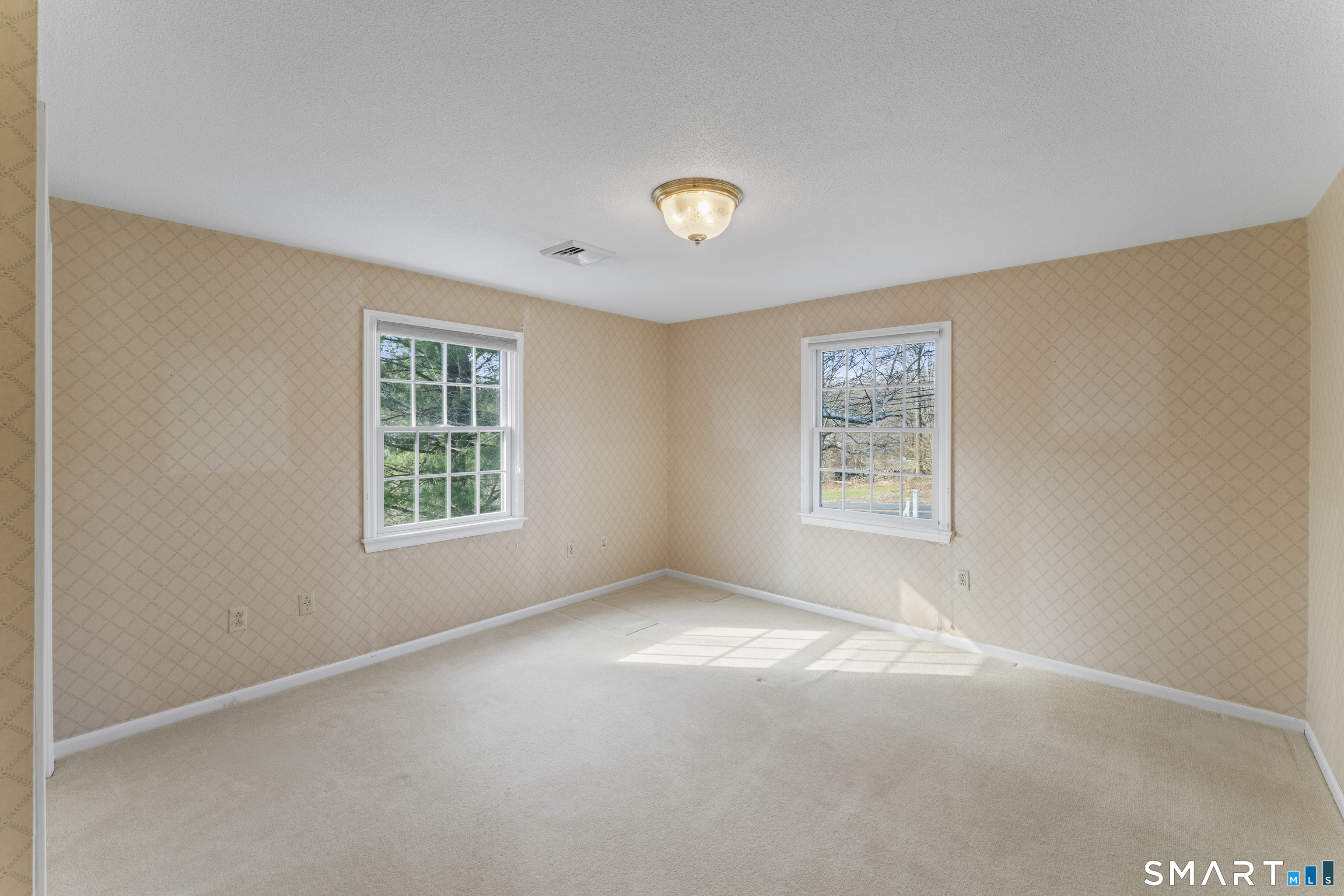 30 Currituck Road Newtown, CT 06470 - Photo 33 of 38 an empty room with a window
