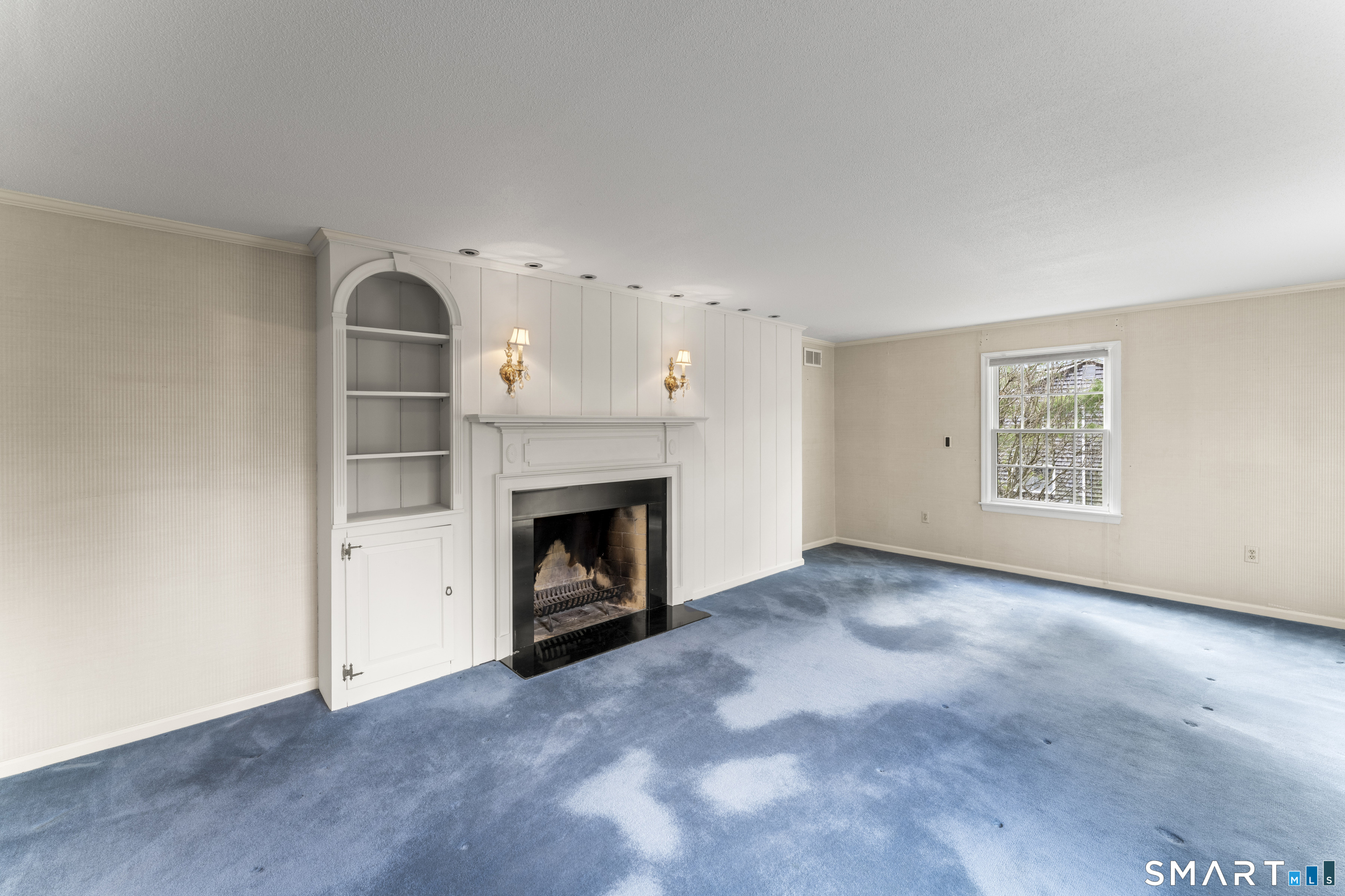 30 Currituck Road Newtown, CT 06470 - Photo 5 of 38 an empty room with windows and fireplace