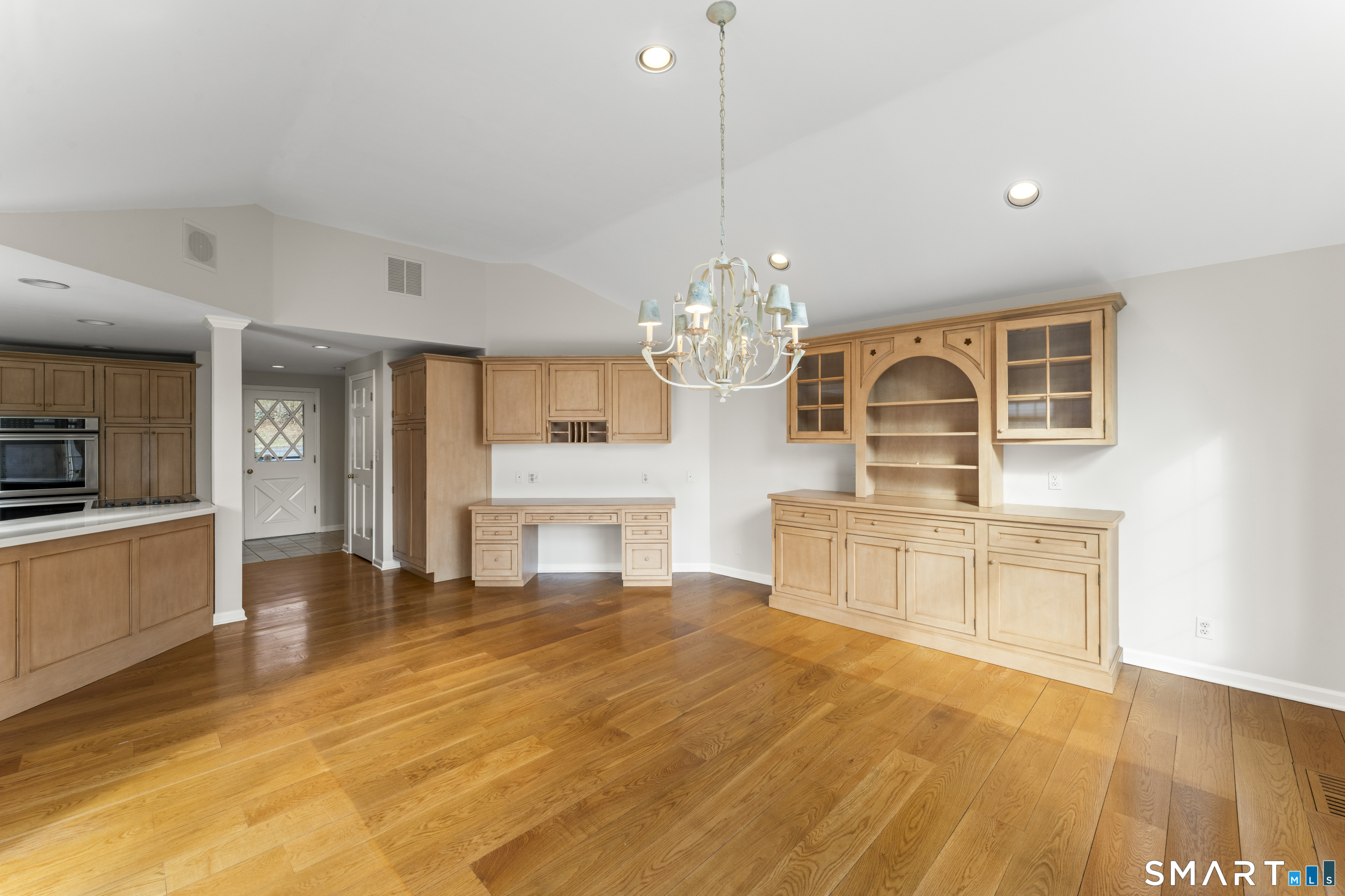 30 Currituck Road Newtown, CT 06470 - Photo 9 of 38 a large kitchen with kitchen island a sink stainless steel appliances and cabinets