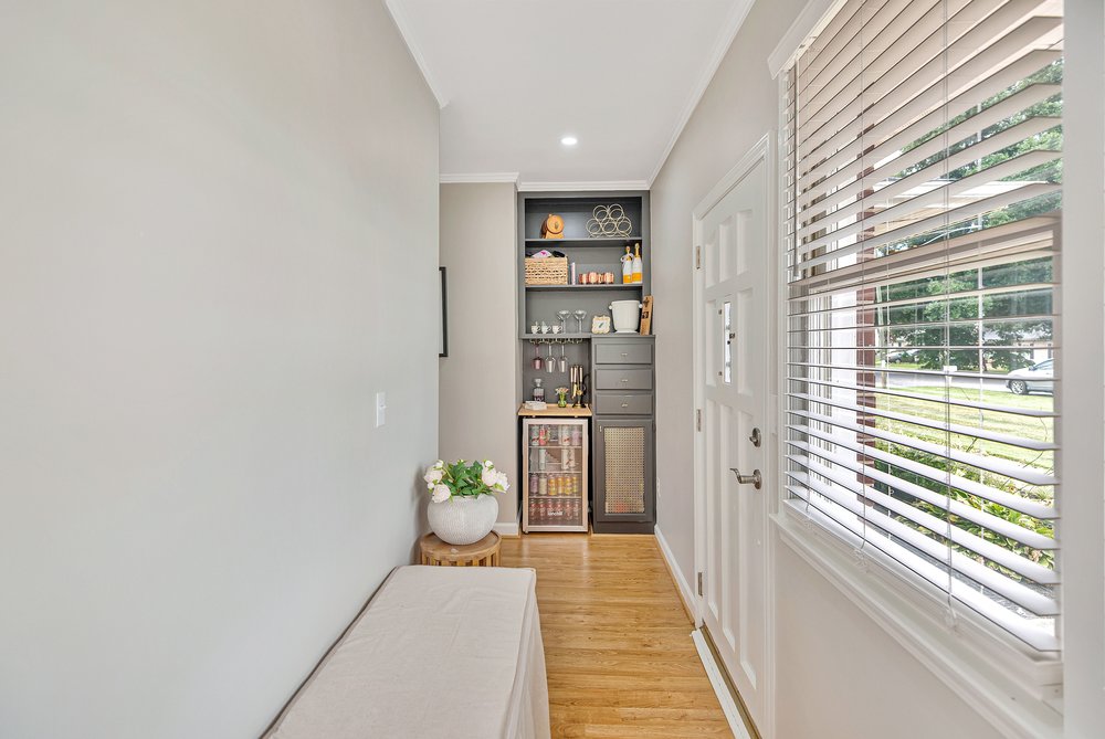 2310 Hannah Road Anderson, SC 29621 - Photo 23 of 32 A clever entryway mudroom built-in features a mini-bar, maximizing functional space and convenience.
