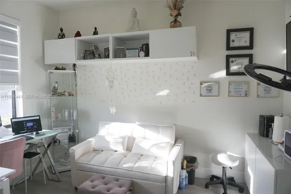a bathroom with a shower and a mirror