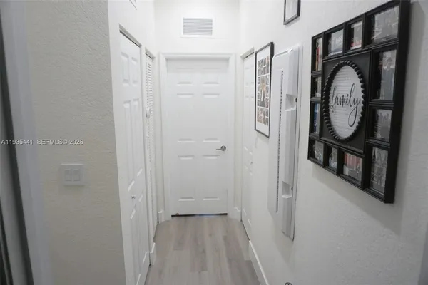 a view of bathroom with a washer and dryer