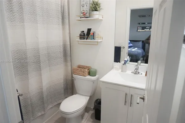 a bathroom with a sink and a toilet