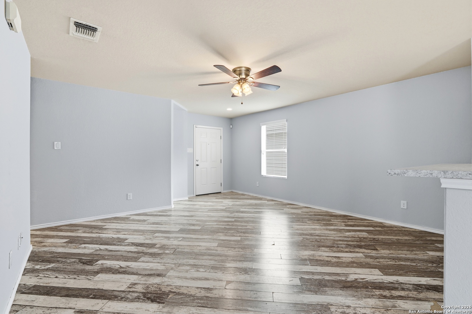 9713 Sandy Rdg Way San Antonio, TX 78239 - Photo 11 of 39 a view of an empty room with a window