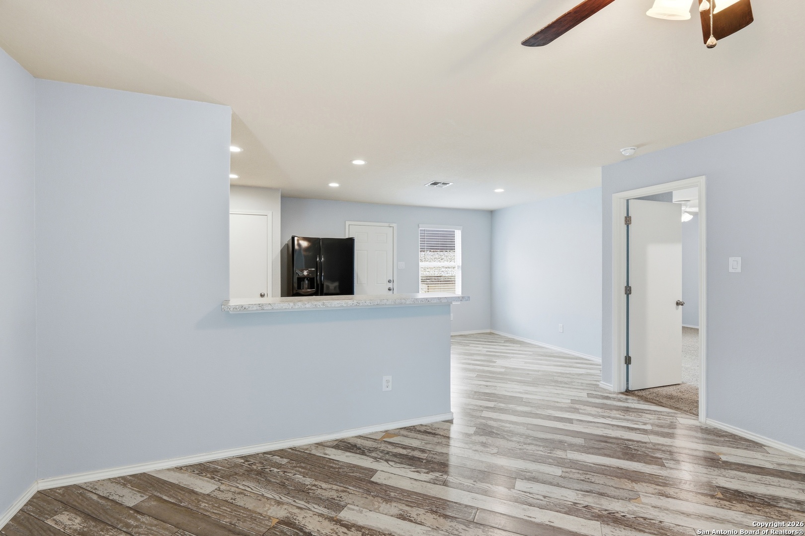 9713 Sandy Rdg Way San Antonio, TX 78239 - Photo 13 of 39 a view of livingroom with hardwood floor