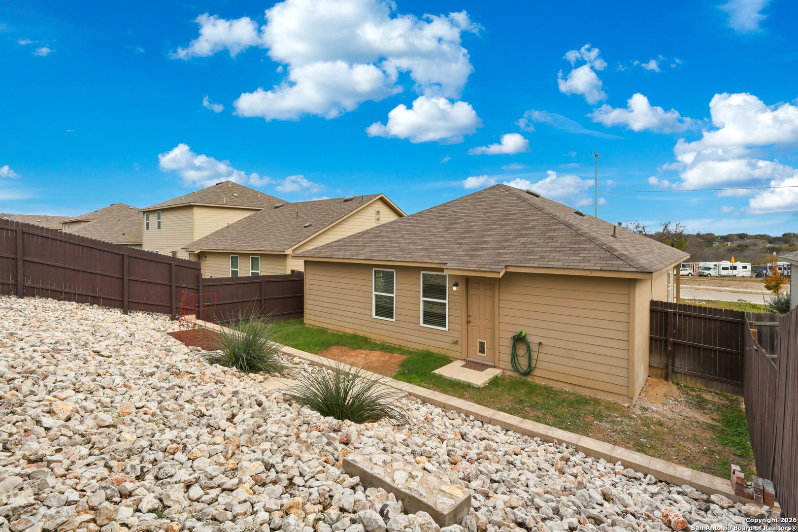 9713 Sandy Rdg Way San Antonio, TX 78239 - Photo 32 of 39 a view of a house with a yard