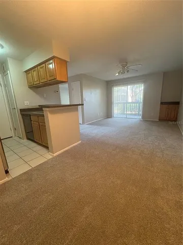 a view of a kitchen with a sink and dishwasher