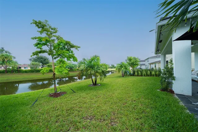 a view of a garden with a lake