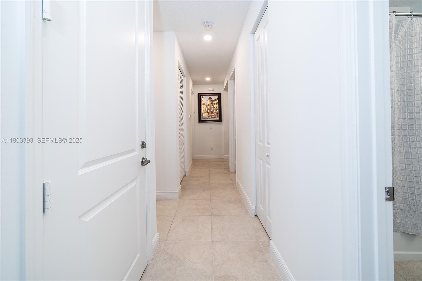 4230 Rosa Drive Deerfield Beach, FL 33064 - Photo 36 of 52 a view of a hallway