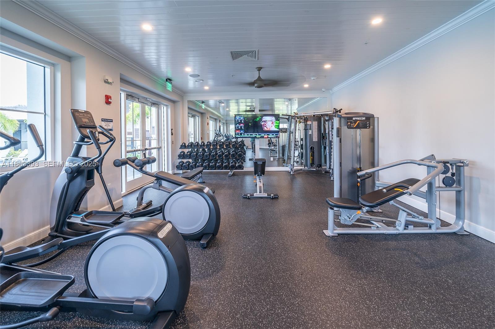 4230 Rosa Drive Deerfield Beach, FL 33064 - Photo 51 of 52 a view of a room with gym equipment