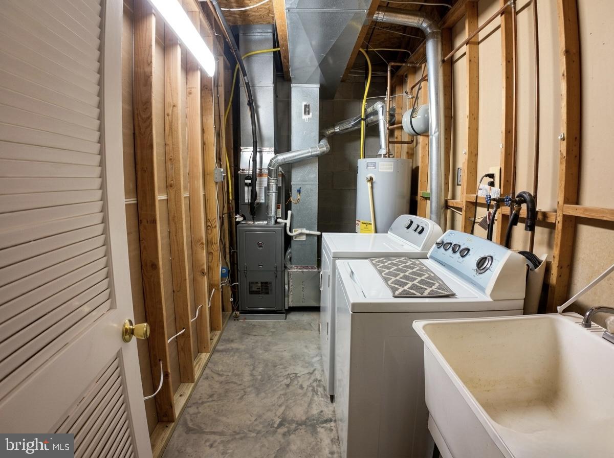3614 Fawn Spring Court Baltimore, MD 21234 - Photo 8 of 22 a utility room with dryer and washer