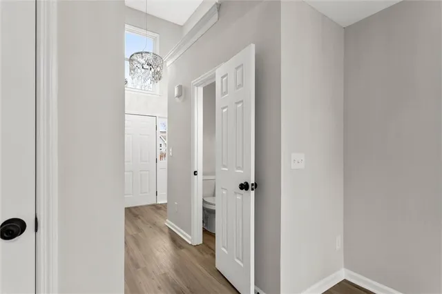 a view of a bathroom from the hallway