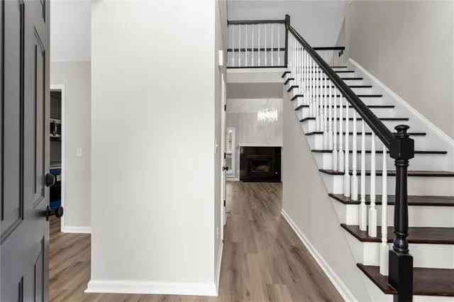a view of entryway with wooden floor