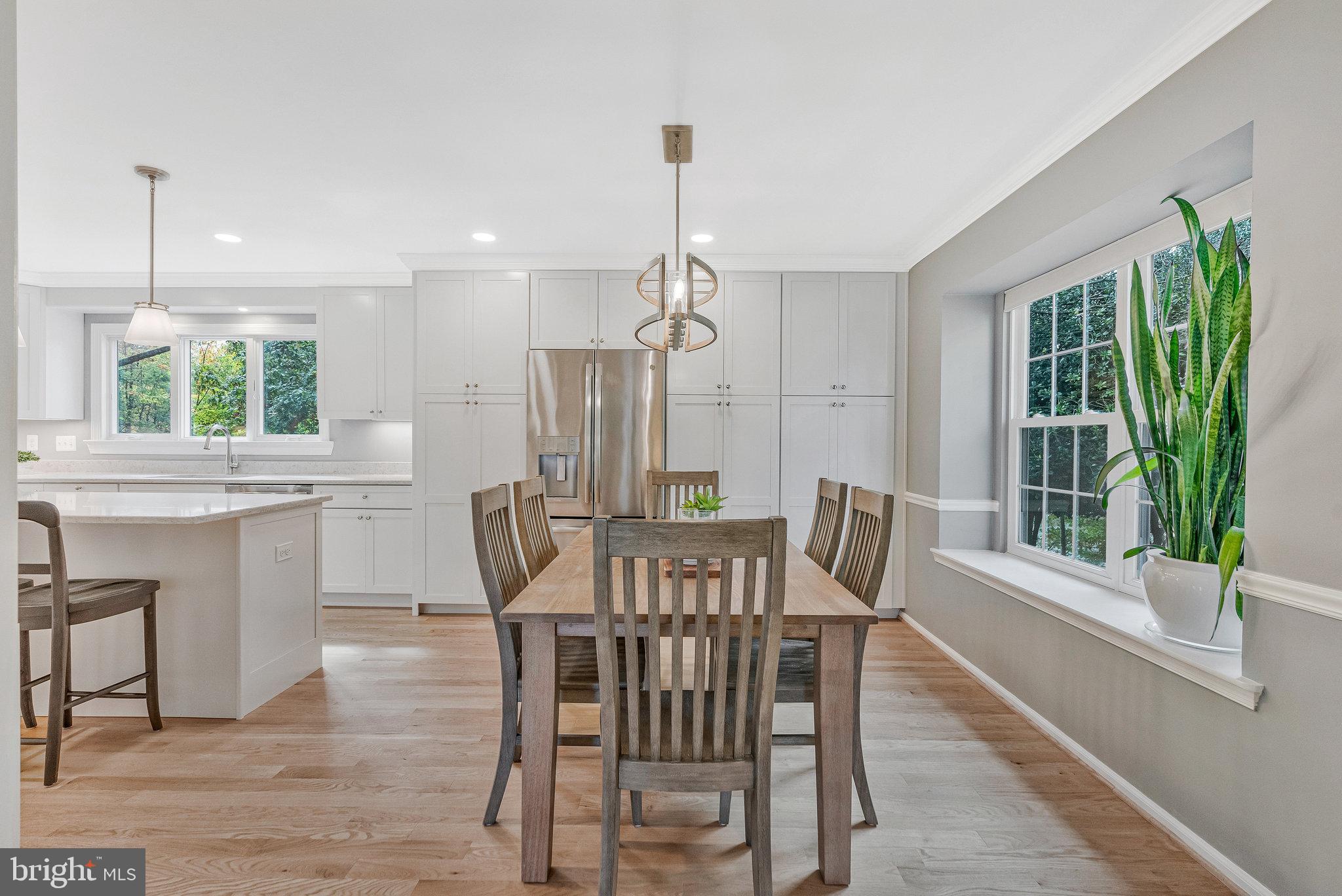 7 South Lowery Court Sterling, VA 20165 - Photo 13 of 63 a view of a dining room with furniture window and outside view