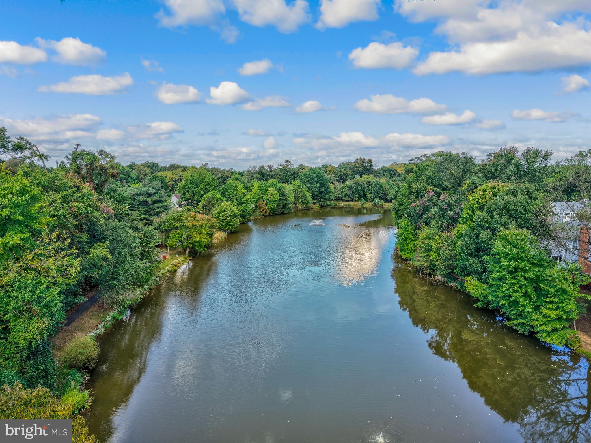 7 South Lowery Court Sterling, VA 20165 - Photo 57 of 63 a view of a lake with houses in the back