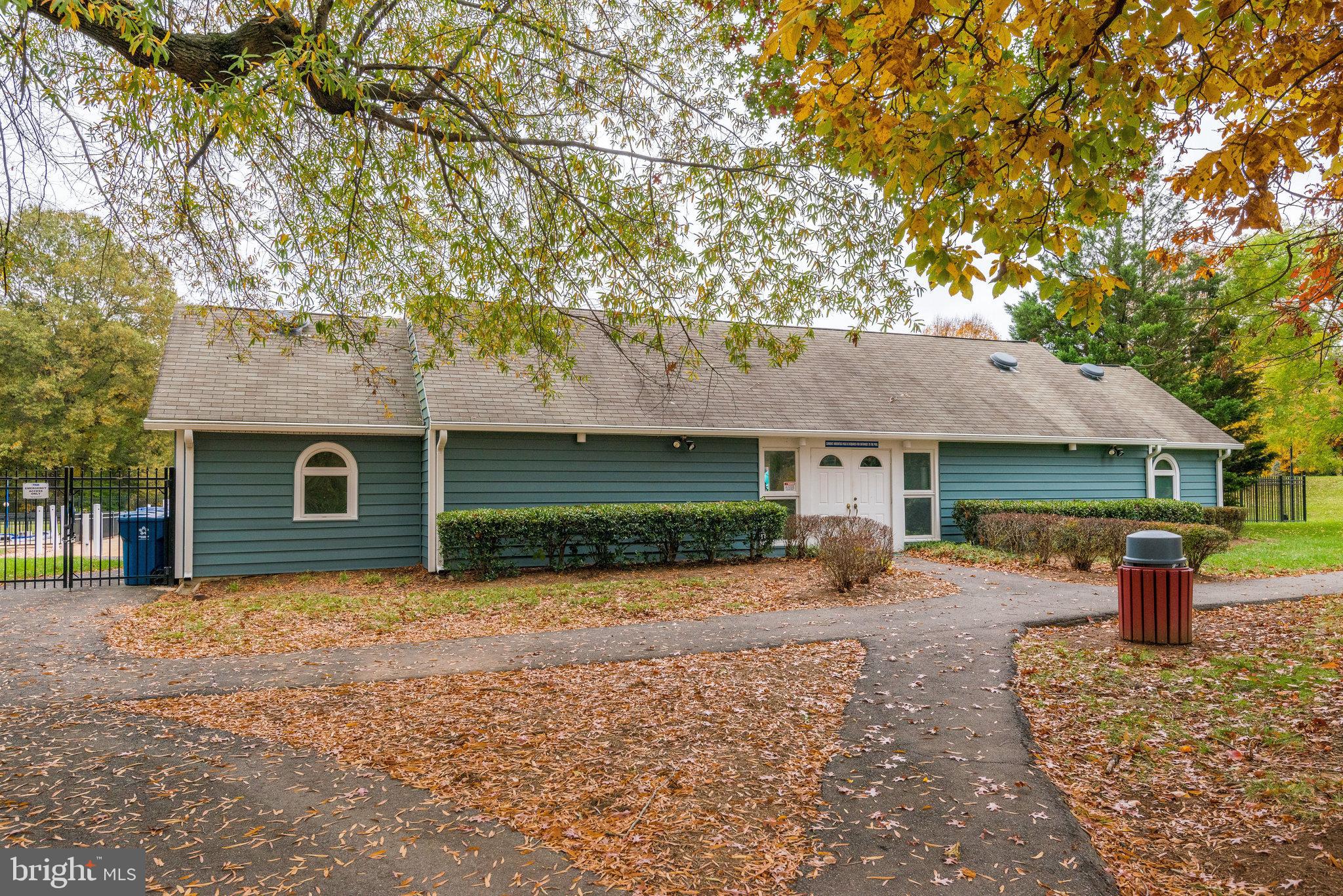 7 South Lowery Court Sterling, VA 20165 - Photo 61 of 63 a front view of a house with a yard