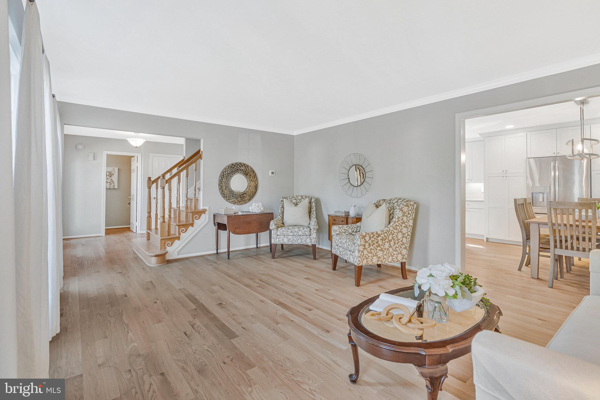 7 South Lowery Court Sterling, VA 20165 - Photo 7 of 63 a living room with furniture and wooden floor