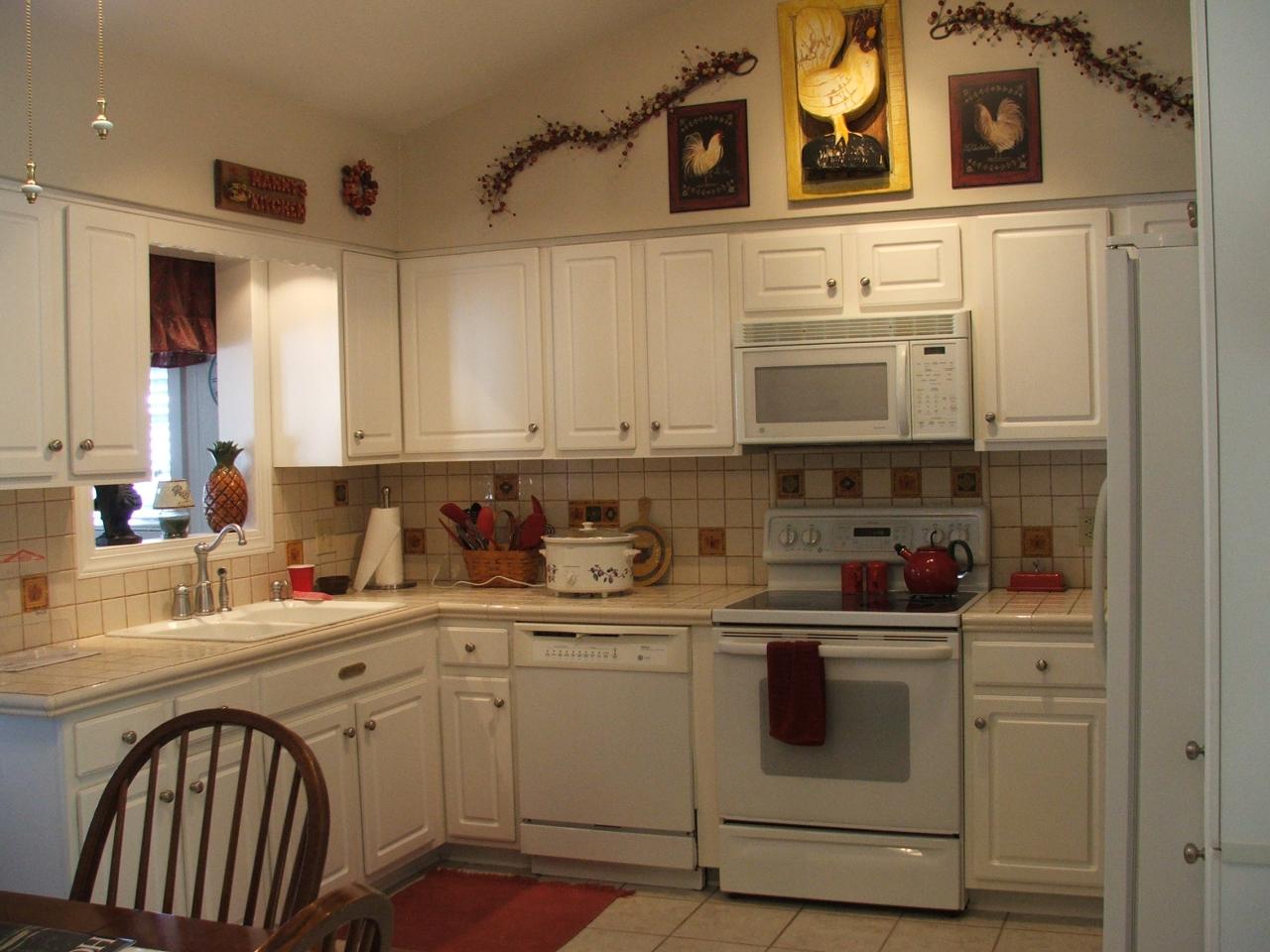 1124 Mountain View Road Vinton, VA 24179 - Photo 3 of 10 a kitchen with stainless steel appliances granite countertop a sink and cabinets with wooden floor