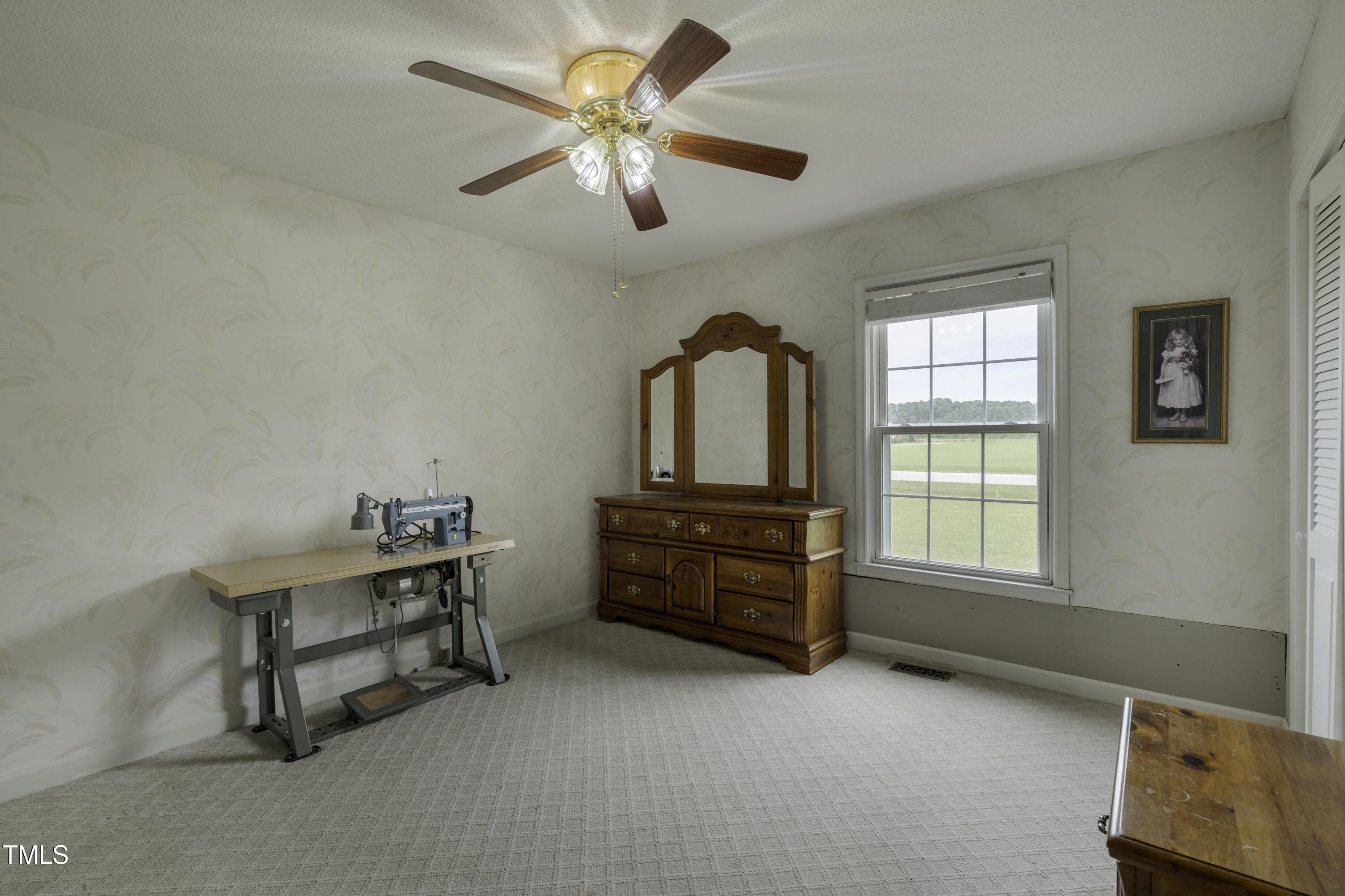 623 O B J Road Dunn, NC 28334 - Photo 15 of 36 a room with furniture and window