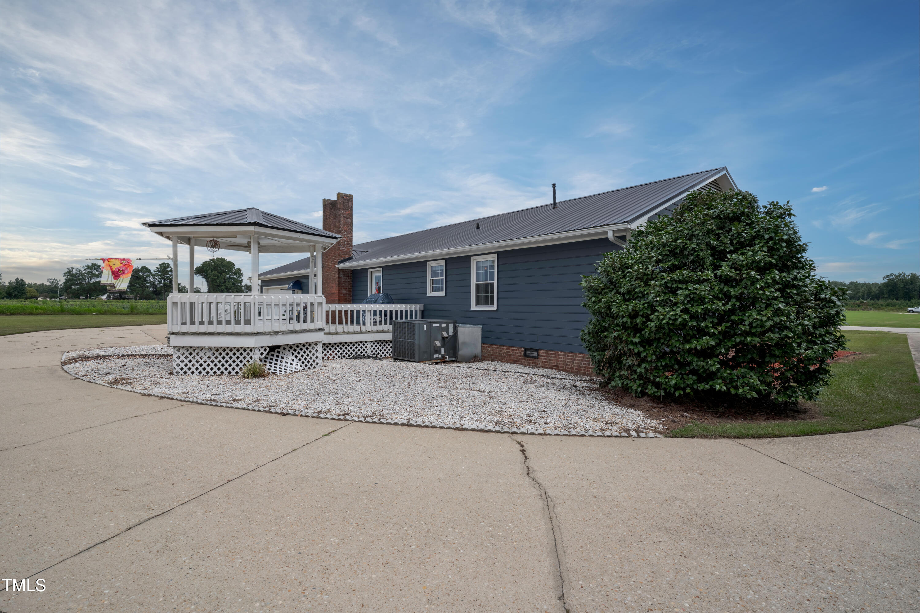 623 O B J Road Dunn, NC 28334 - Photo 26 of 36 a front view of a house with a yard and garage