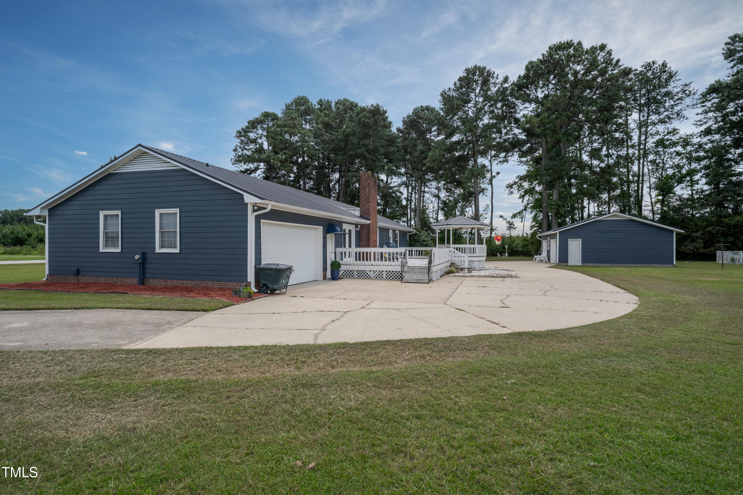 623 O B J Road Dunn, NC 28334 - Photo 27 of 36 a view of a house with a backyard