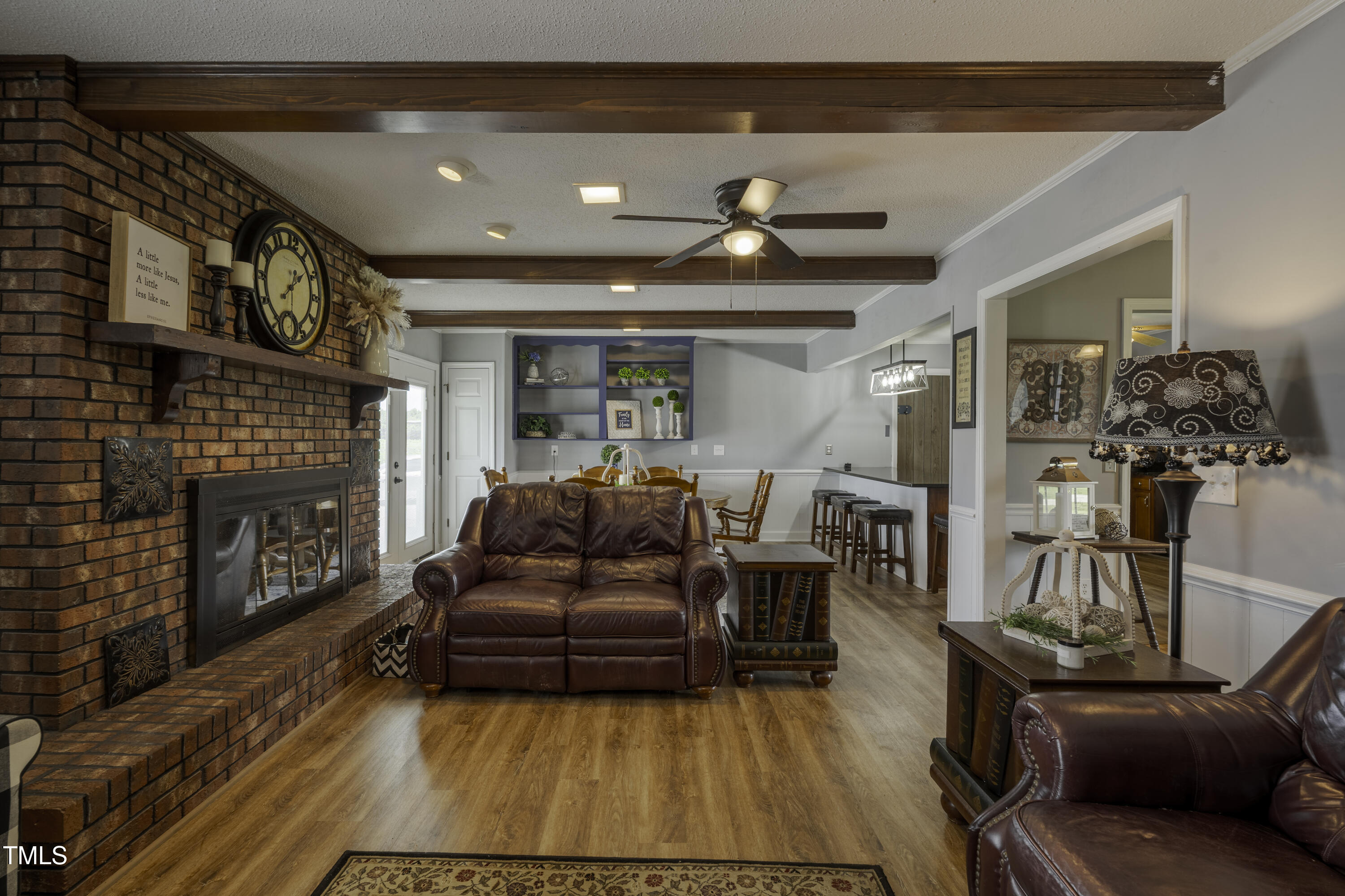 623 O B J Road Dunn, NC 28334 - Photo 3 of 36 a living room with furniture and a fireplace