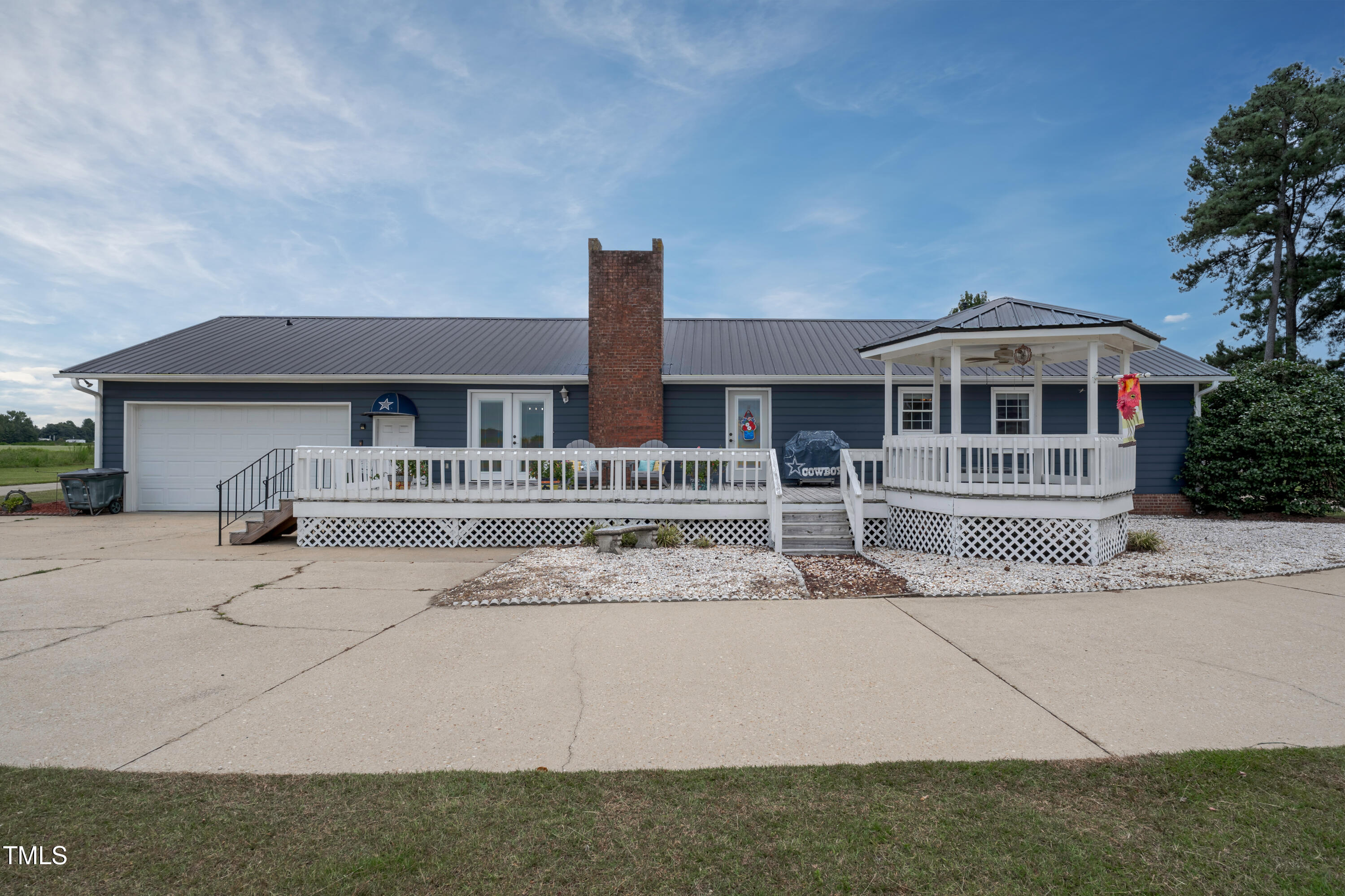623 O B J Road Dunn, NC 28334 - Photo 6 of 36 a front view of a house with garden