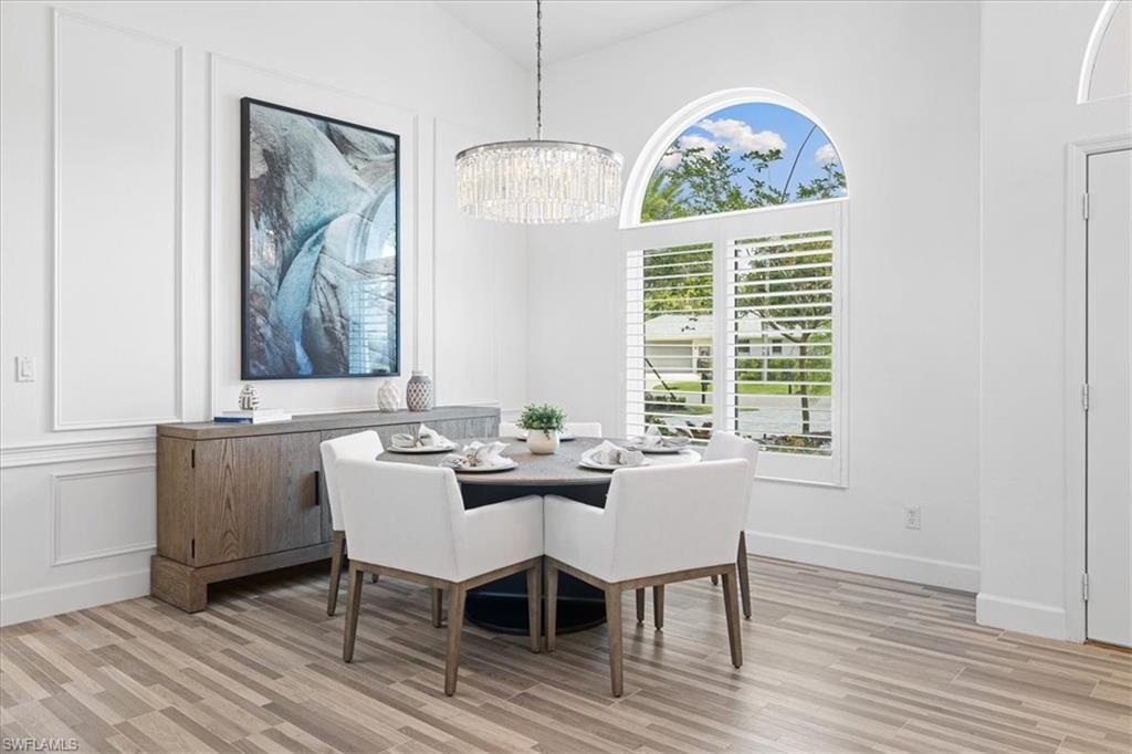 2032 Prince Drive Naples, FL 34110 - Photo 15 of 44 a view of a dining room with furniture window and outside view