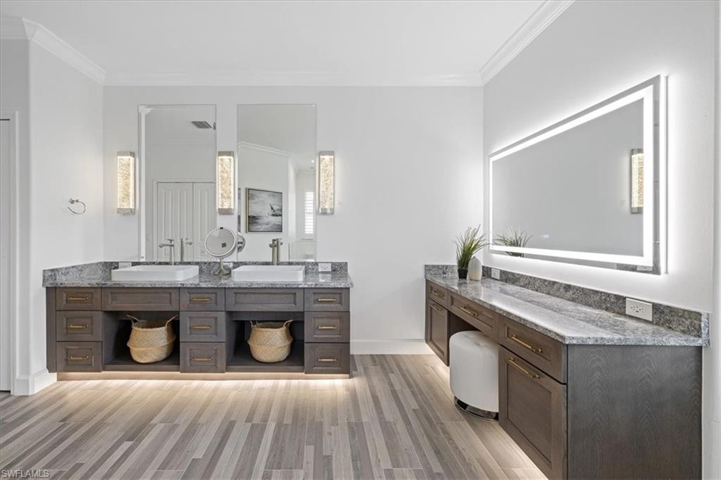 2032 Prince Drive Naples, FL 34110 - Photo 20 of 44 a kitchen with a stove and a sink