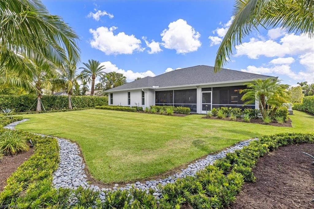 2032 Prince Drive Naples, FL 34110 - Photo 27 of 44 a view of a house with a big yard