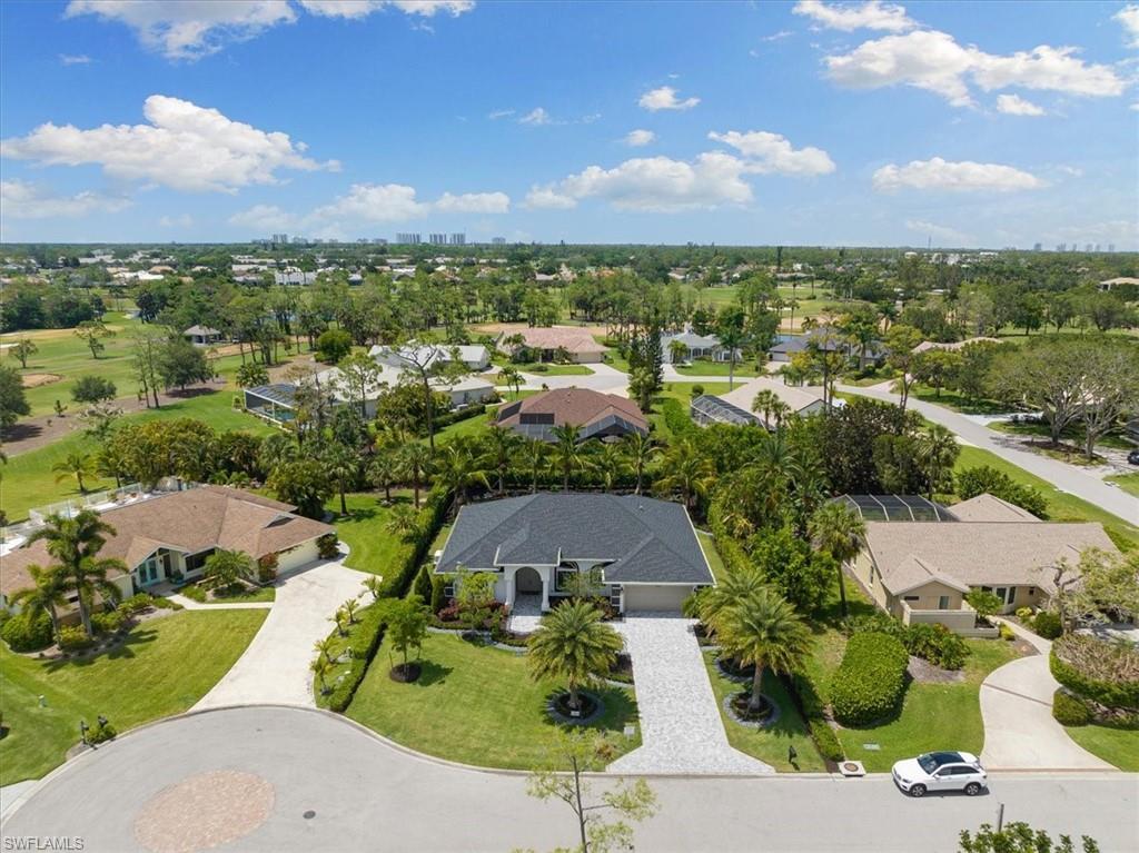 2032 Prince Drive Naples, FL 34110 - Photo 30 of 44 an aerial view of a house with a garden