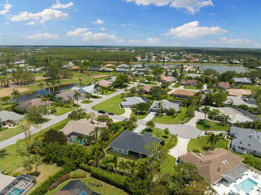 2032 Prince Drive Naples, FL 34110 - Photo 33 of 44 an aerial view of residential houses with outdoor space