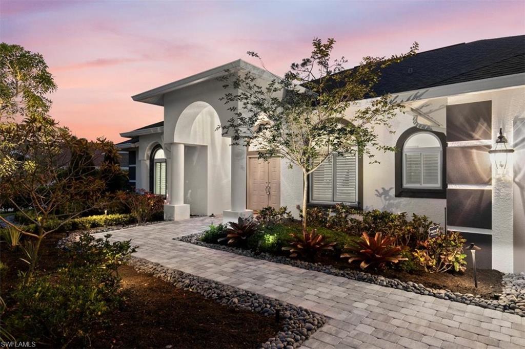 2032 Prince Drive Naples, FL 34110 - Photo 43 of 44 a front view of a house