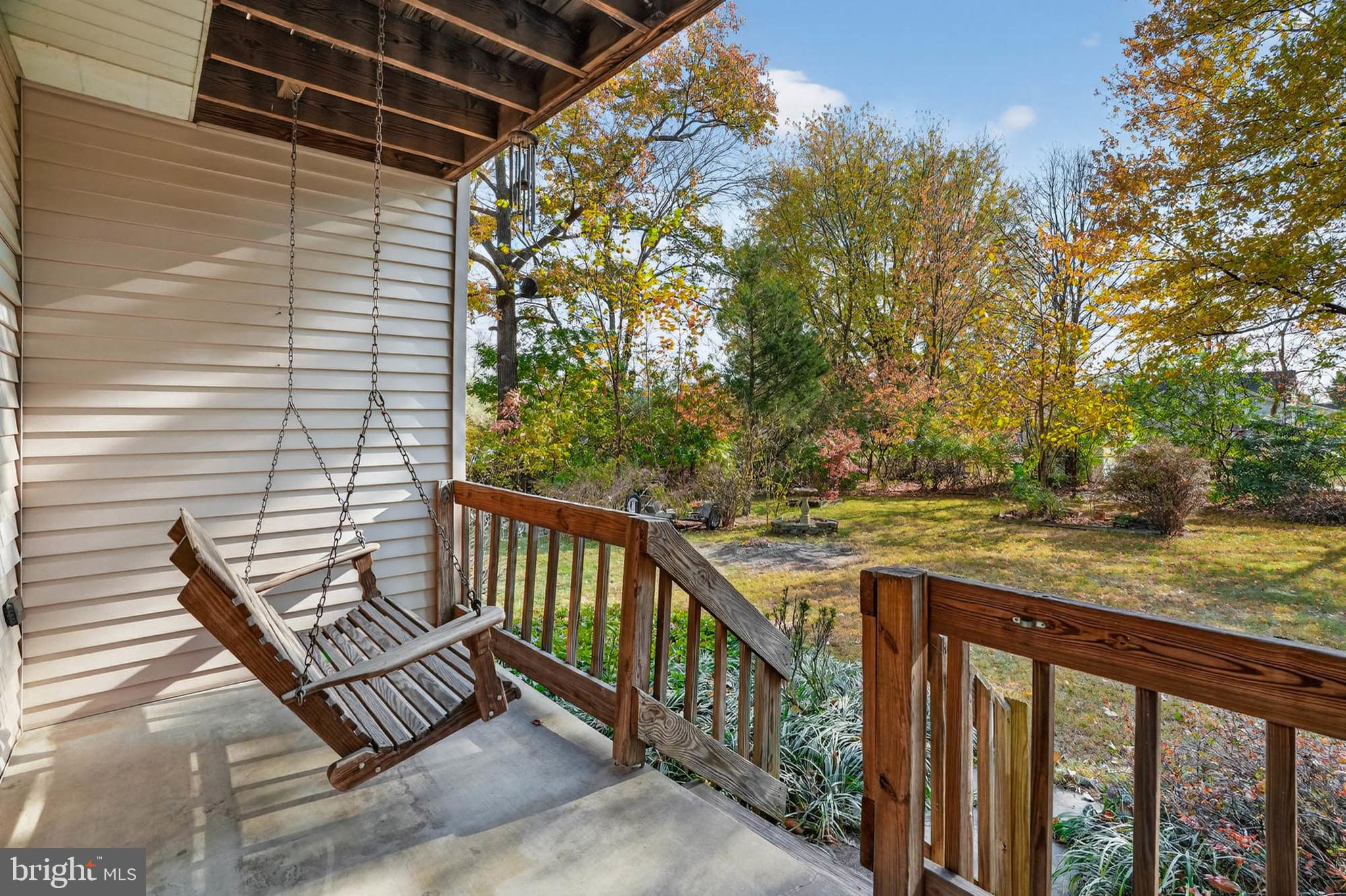 8203 Willow Street Laurel, MD 20707 - Photo 18 of 41 a view of a chair and table in the balcony