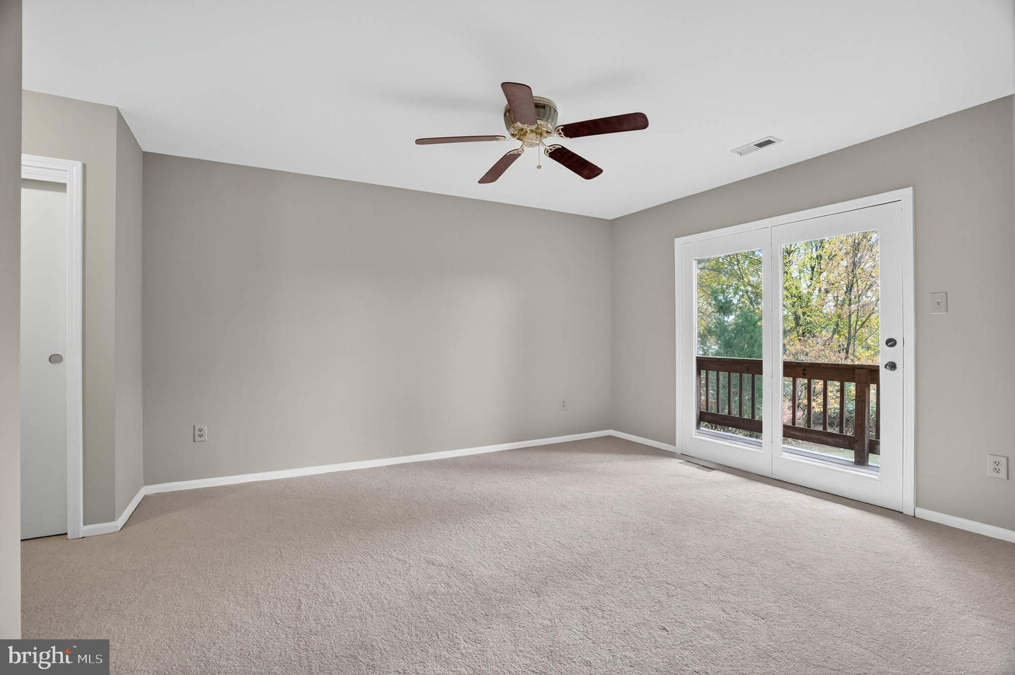 8203 Willow Street Laurel, MD 20707 - Photo 22 of 41 a view of an empty room with a window