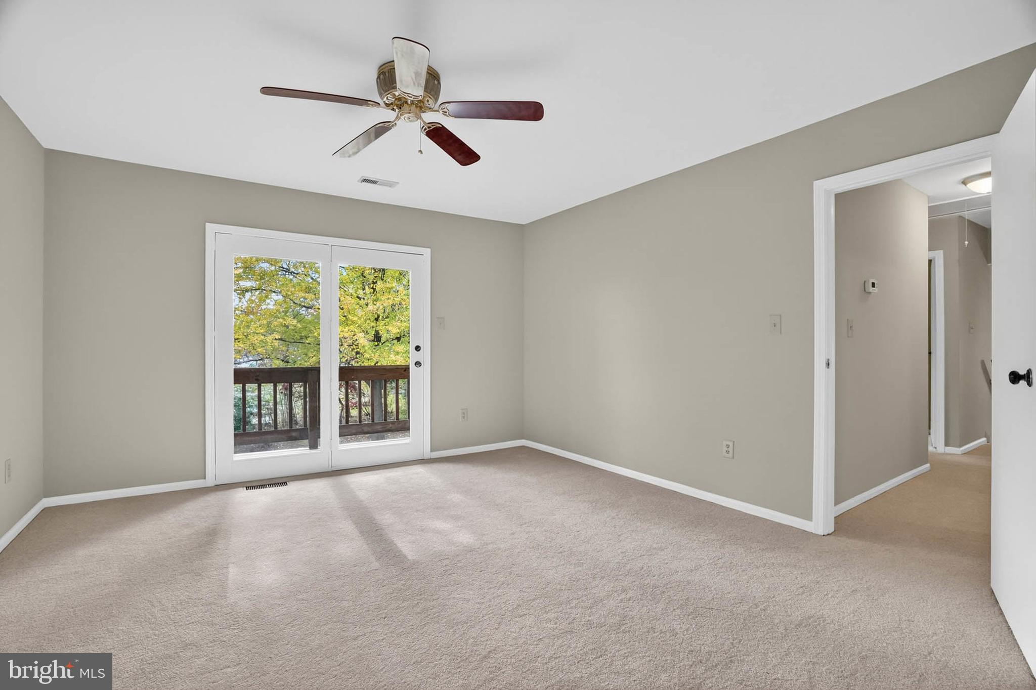 8203 Willow Street Laurel, MD 20707 - Photo 23 of 41 a view of an empty room with a window