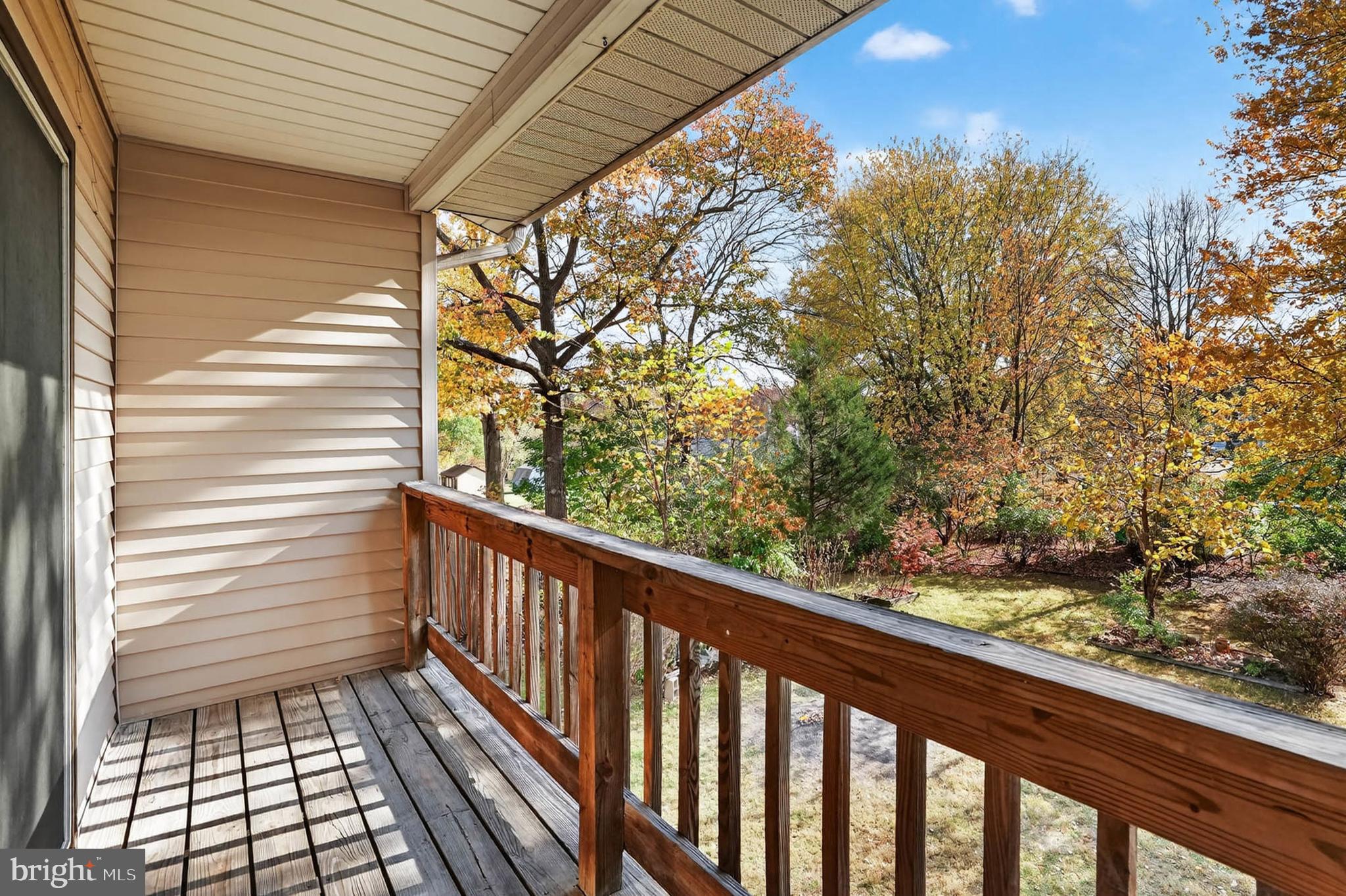8203 Willow Street Laurel, MD 20707 - Photo 25 of 41 a view of a balcony with wooden fence