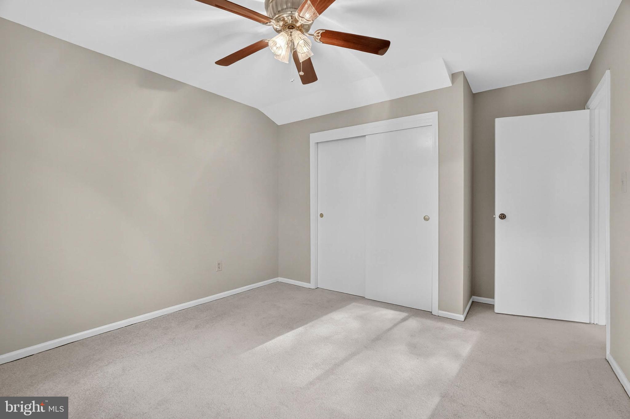 8203 Willow Street Laurel, MD 20707 - Photo 31 of 41 an empty room with windows and fan