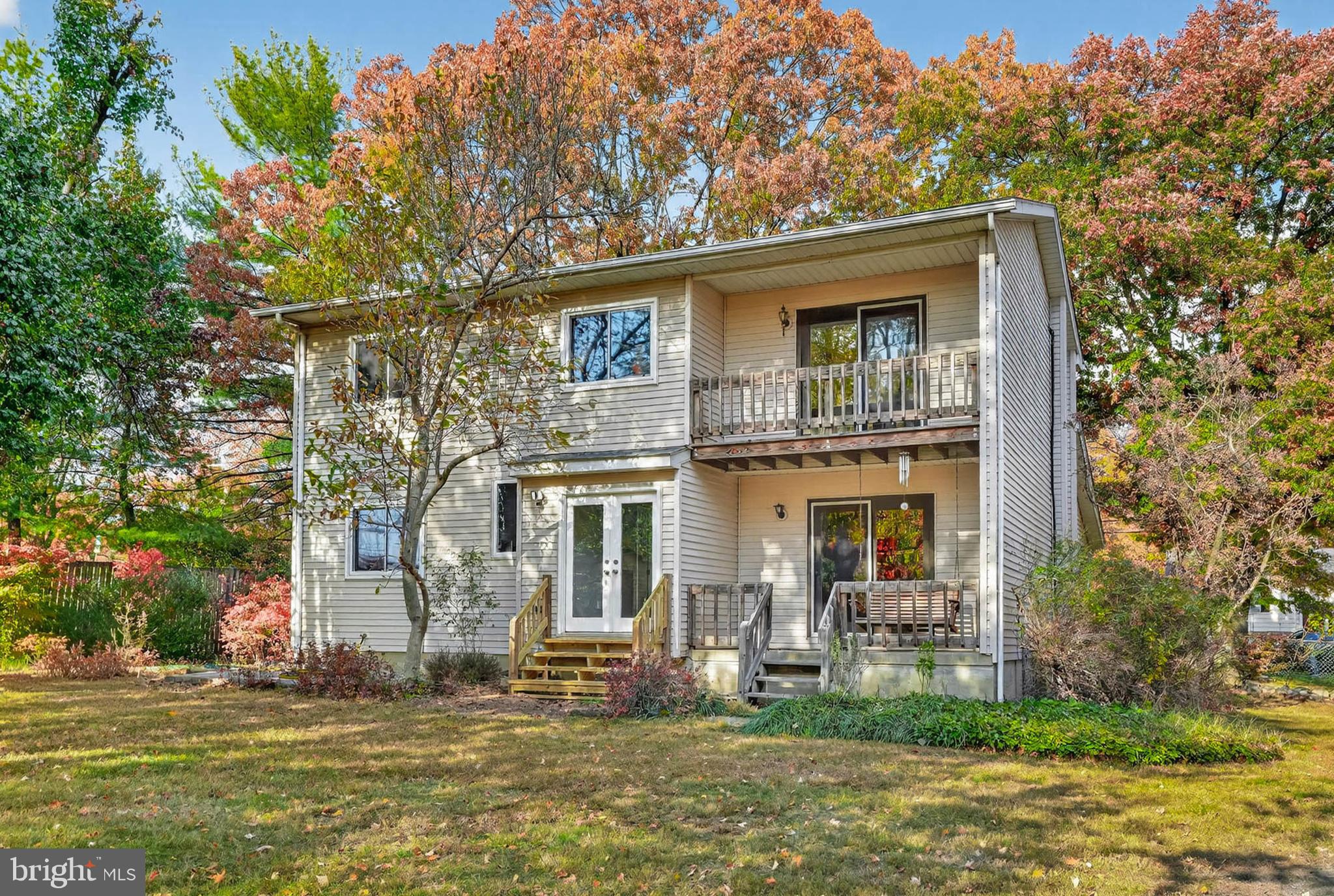 8203 Willow Street Laurel, MD 20707 - Photo 38 of 41 a front view of a house with a garden