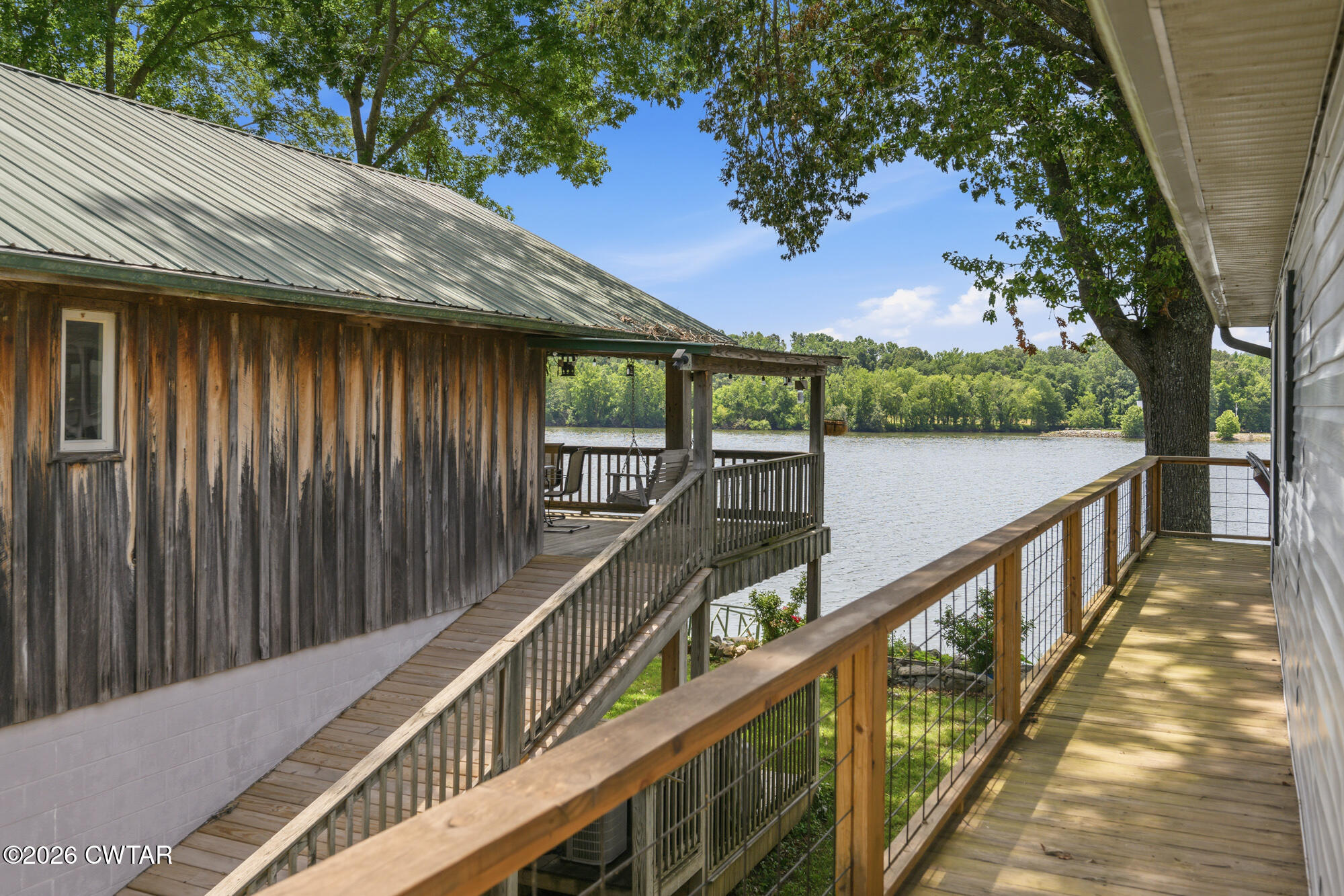 1728 Yarbro Landing Lane Decaturville, TN 38329 - Photo 27 of 44 a view of balcony with wooden floor and fence
