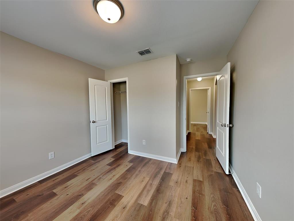 1334 Barrel Drive Dallas, TX 75253 - Photo 11 of 16 a view of a room with wooden floor