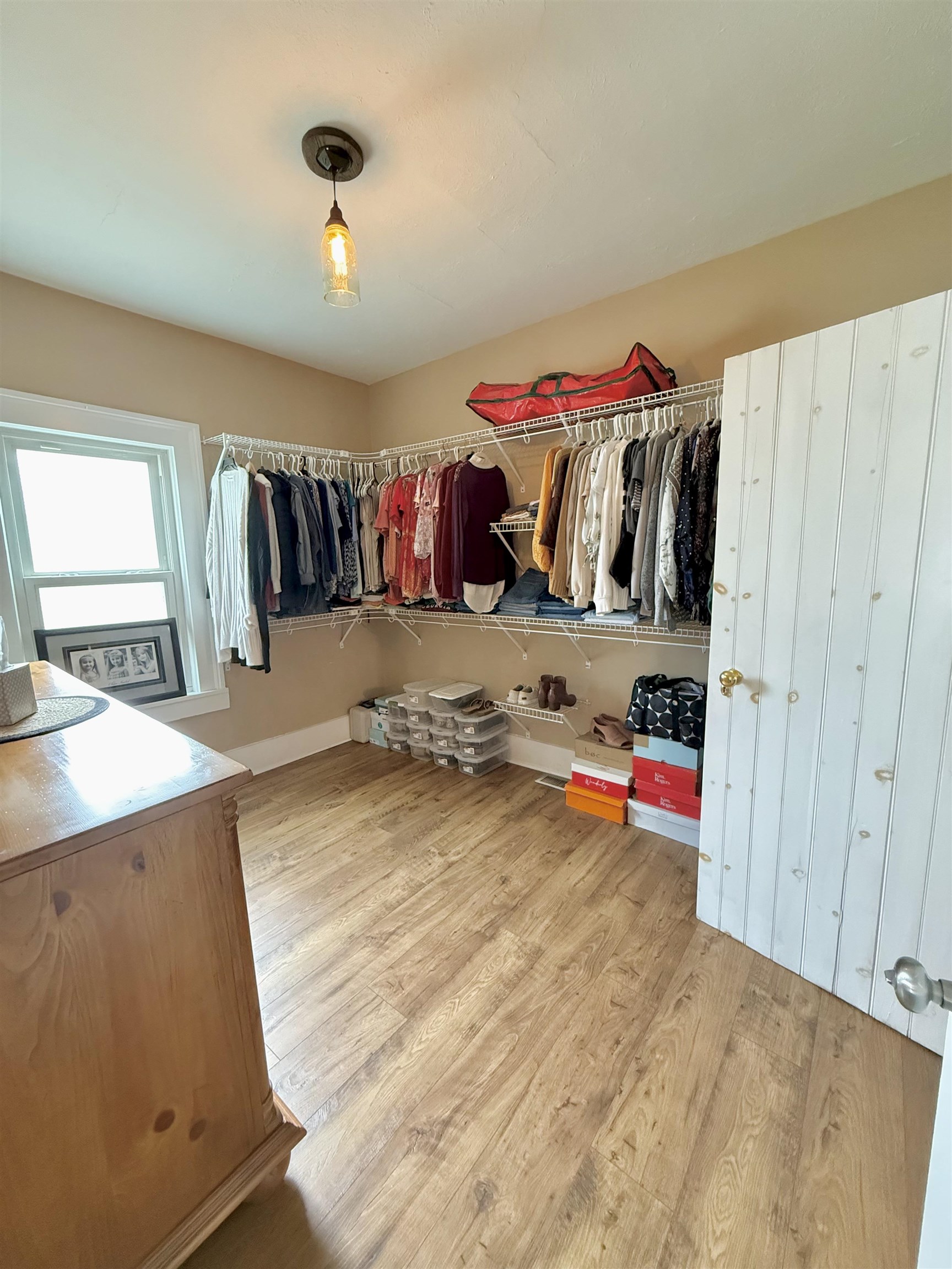 15385 Evergreen Valley Road Timberville, VA 22853 - Photo 19 of 44 a view of a bedroom with baby bed and closet