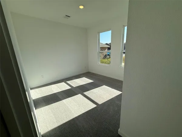 an entryway view with wooden floor