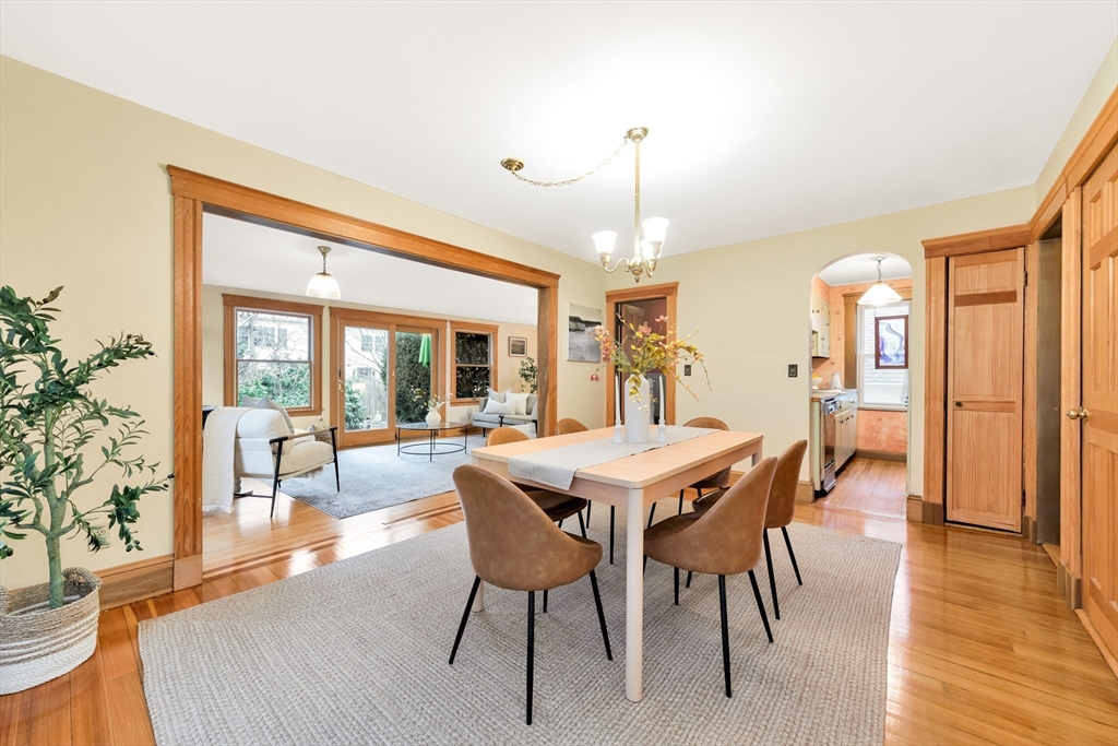 107 Hibbert Street Arlington, MA 02476 - Photo 12 of 40 a view of a dining room with furniture window and wooden floor