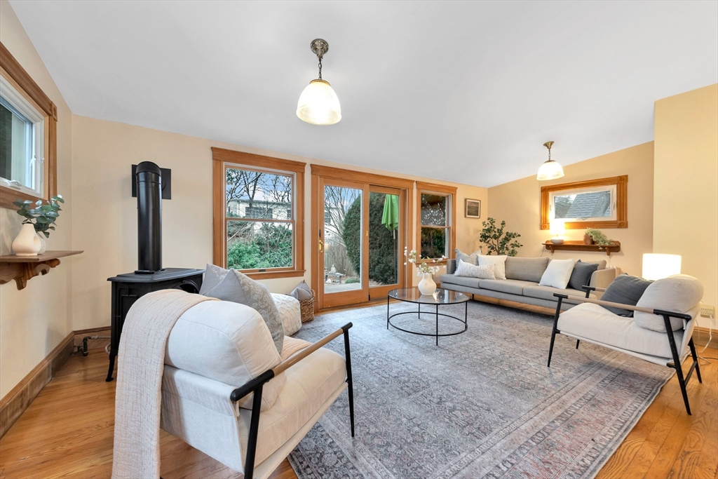 107 Hibbert Street Arlington, MA 02476 - Photo 19 of 40 a living room with furniture and a large window