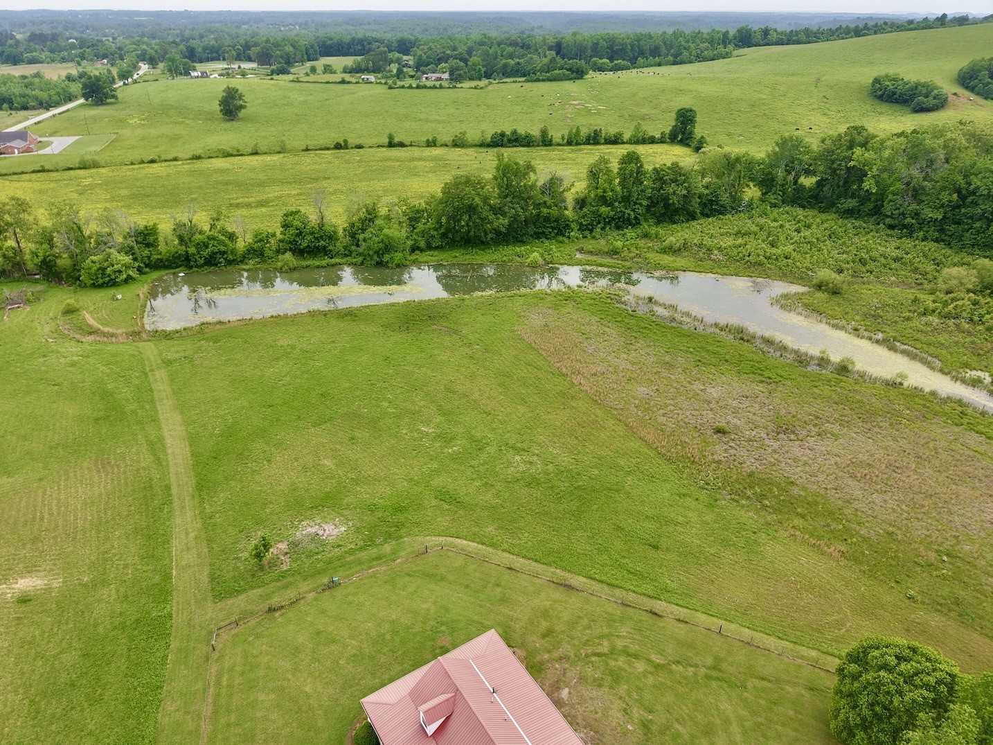 6907 Short Mountain Road Woodbury, TN 37190 - Photo 12 of 35 a view of a field with an ocean