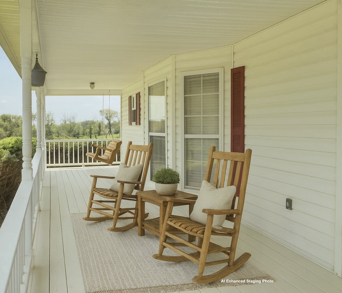 6907 Short Mountain Road Woodbury, TN 37190 - Photo 18 of 35 a view of two chairs in the balcony