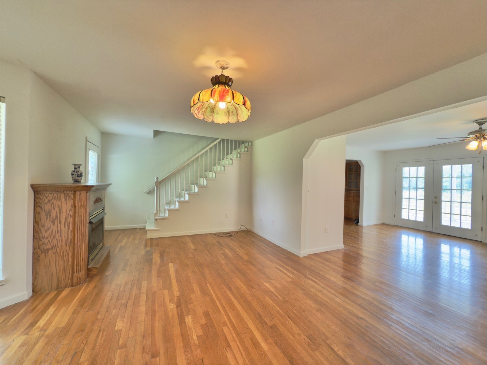 6907 Short Mountain Road Woodbury, TN 37190 - Photo 26 of 35 wooden floor in an empty room with a window