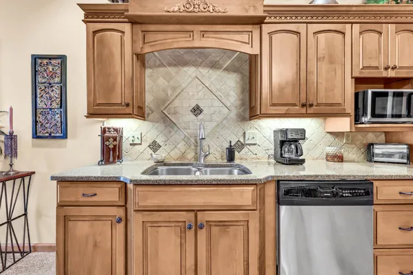 a view of a kitchen and dining area